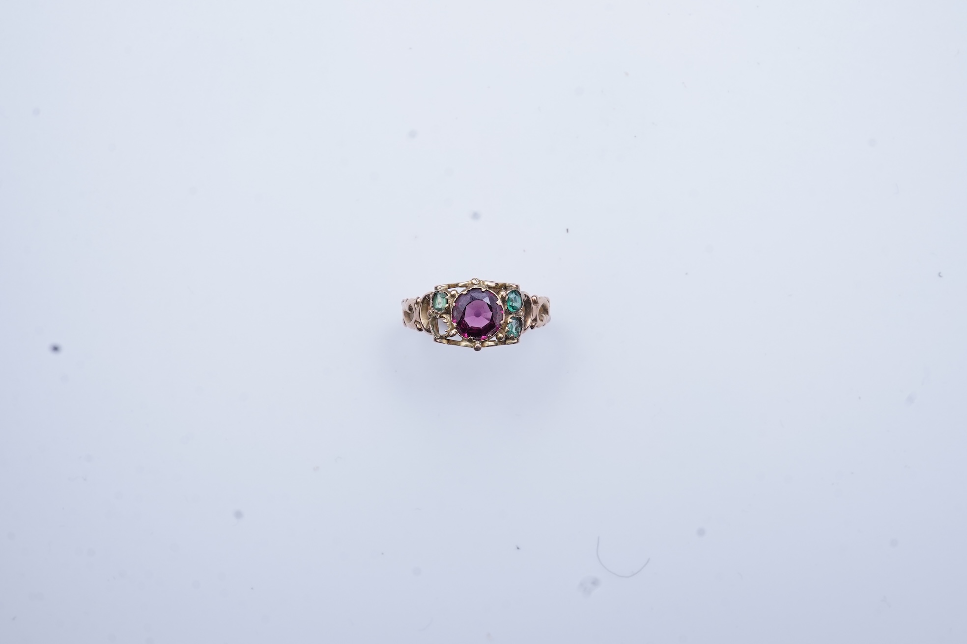 A Victorian garnet and paste ring, circa 1857